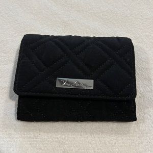 Vera Bradley trifold wallet. In new condition.